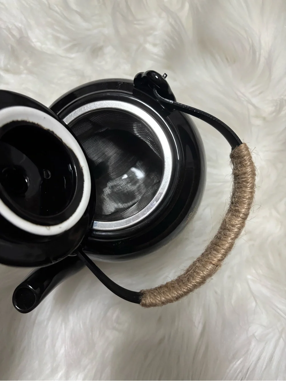 Black and Gold Ceramic Teapot with Woven Handle